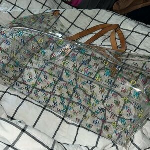 Dooney and Bourke plastic tote with leather straps